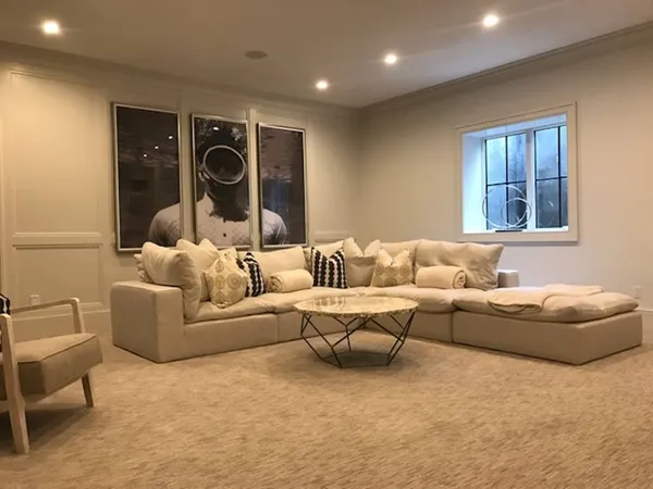 a living room with furniture and window