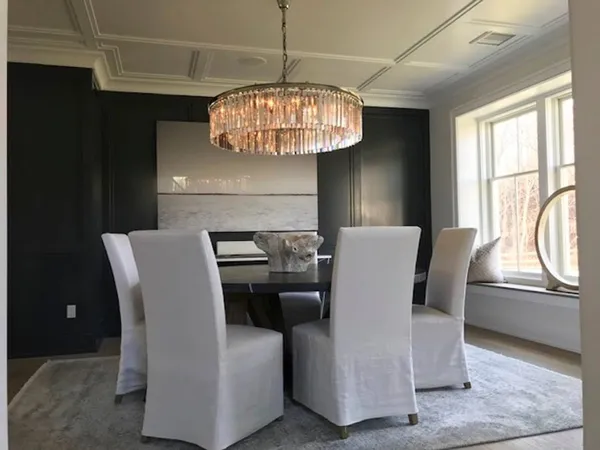 a view of a dining room with furniture window and outside view
