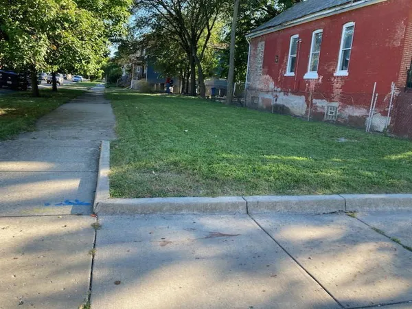 a view of a back yard of the house