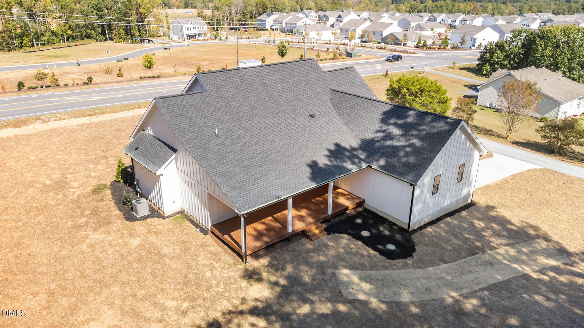 582 Harnett Central Road Fuquay-Varina, NC 27526 - Photo 14 of 51 an aerial view of a house with a yard and lake view