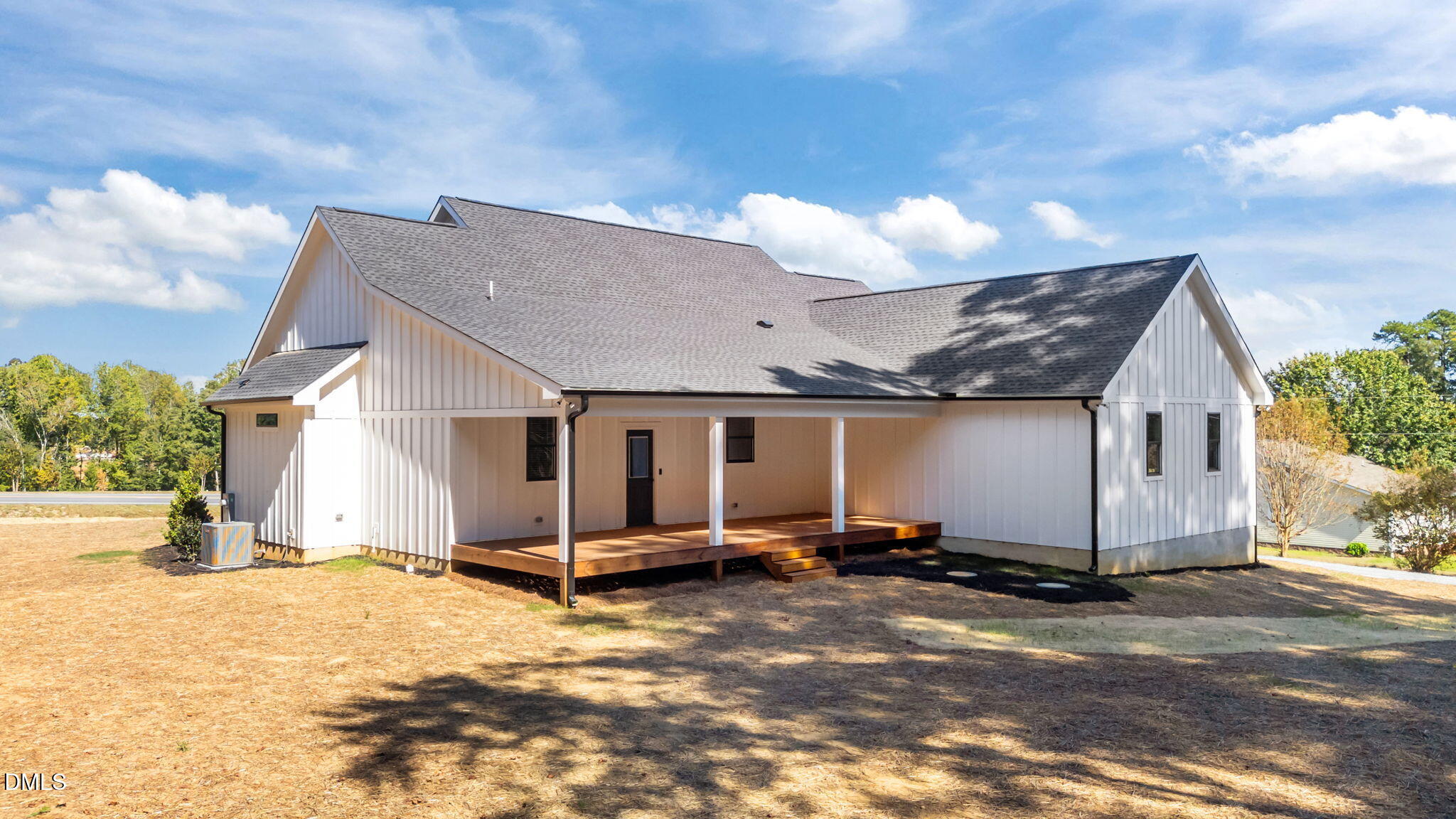 582 Harnett Central Road Fuquay-Varina, NC 27526 - Photo 15 of 51 a view of a house with a yard