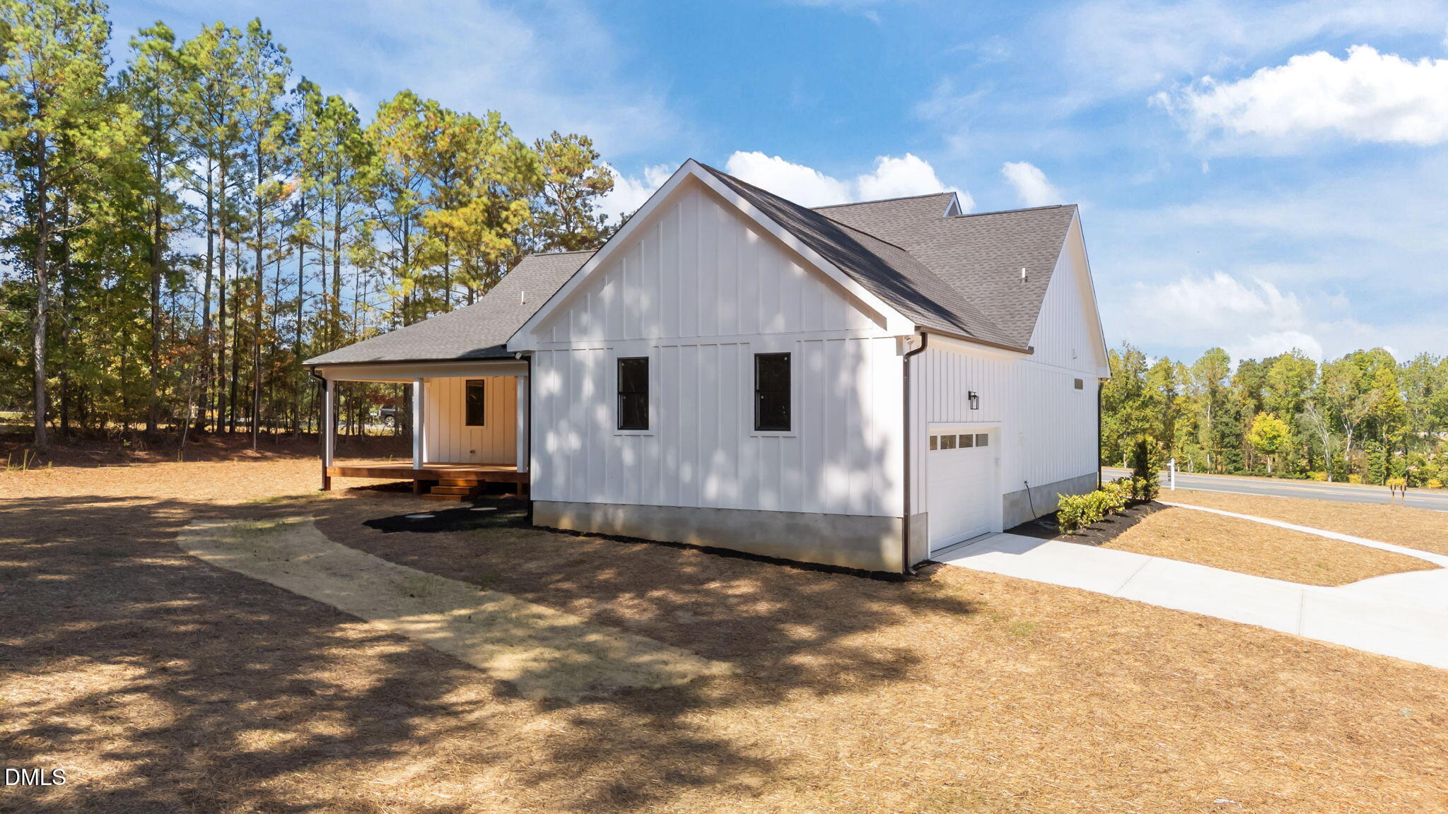 582 Harnett Central Road Fuquay-Varina, NC 27526 - Photo 17 of 51 a view of a house with a yard
