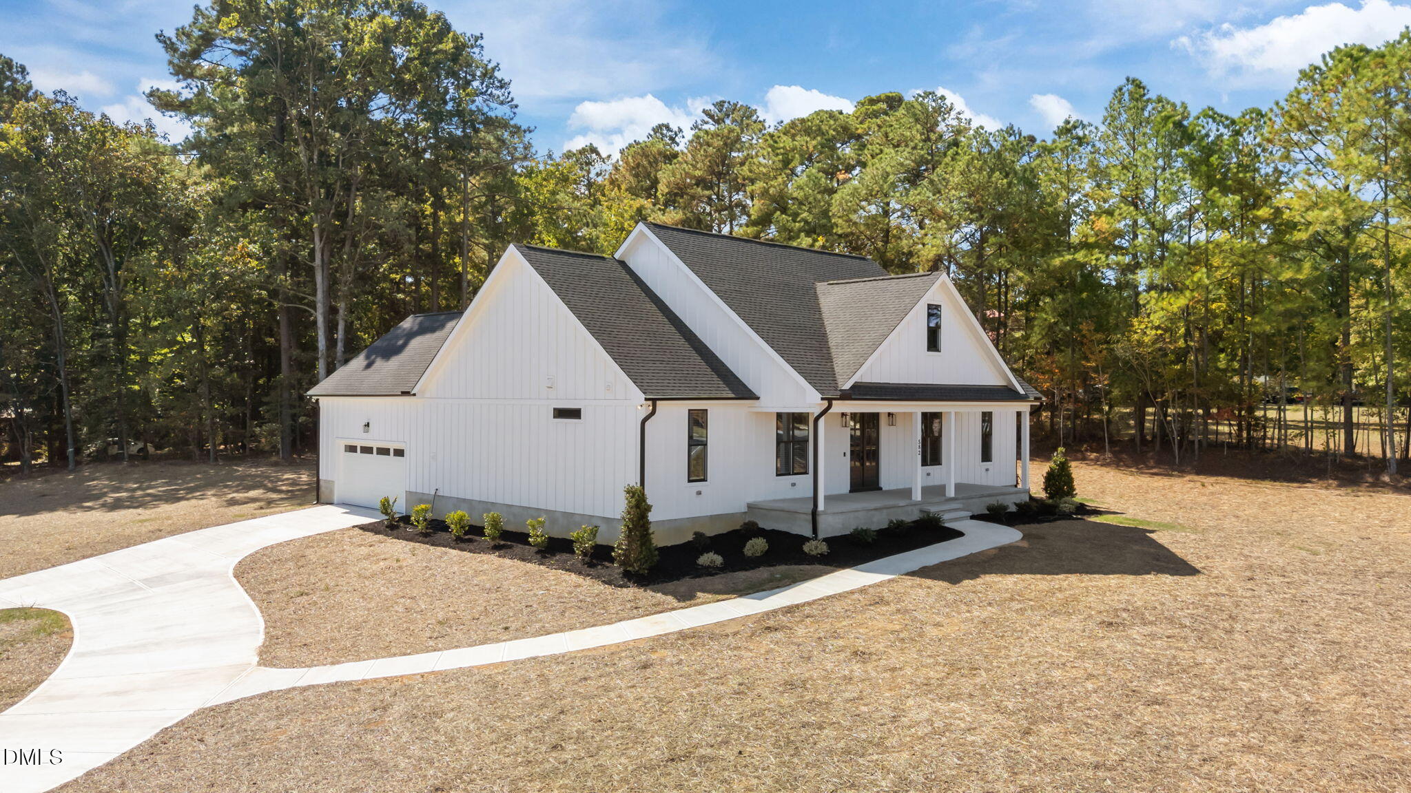 582 Harnett Central Road Fuquay-Varina, NC 27526 - Photo 2 of 51 front view of a house with a yard