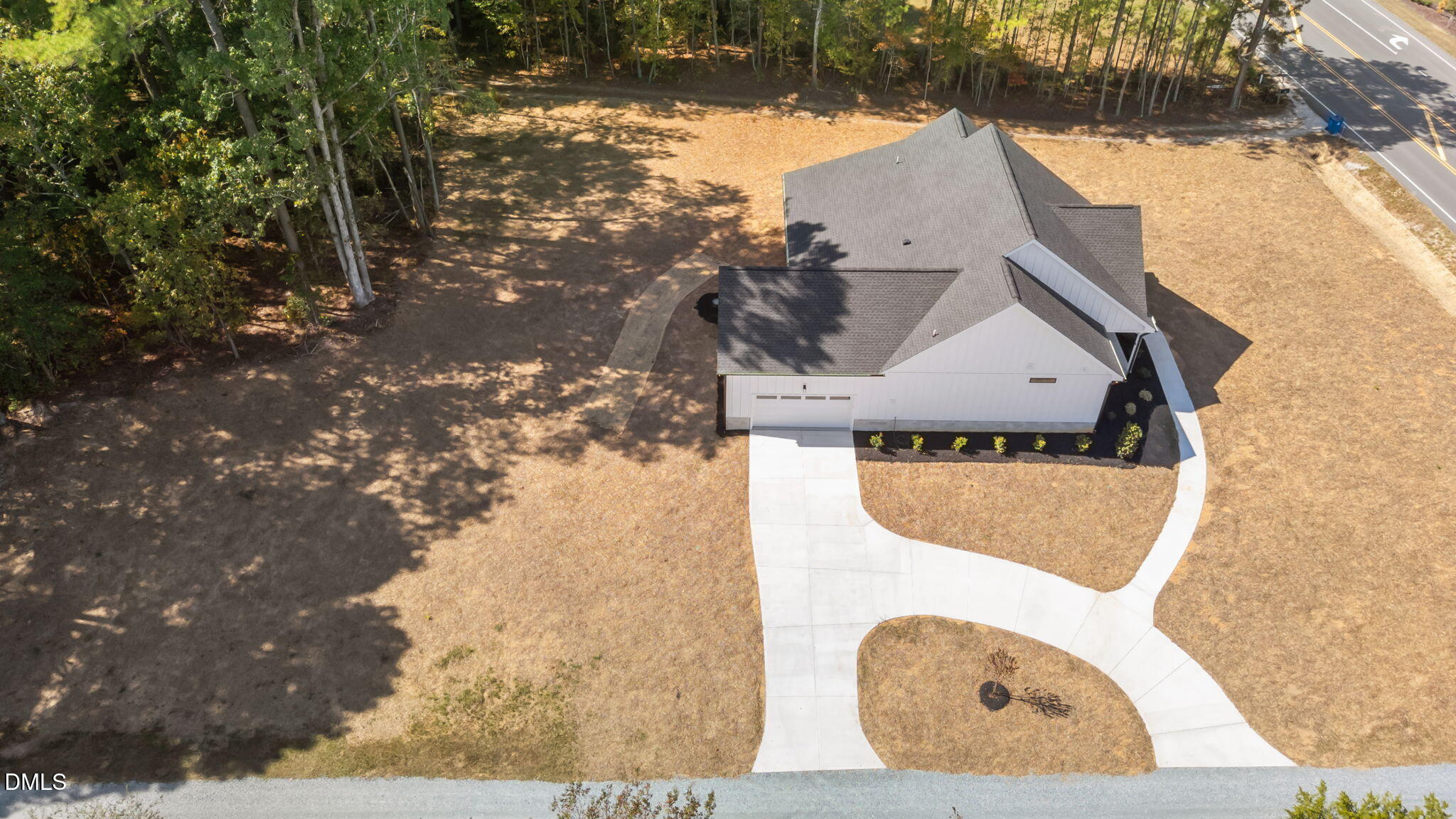 582 Harnett Central Road Fuquay-Varina, NC 27526 - Photo 21 of 51 a front view of a house with a yard