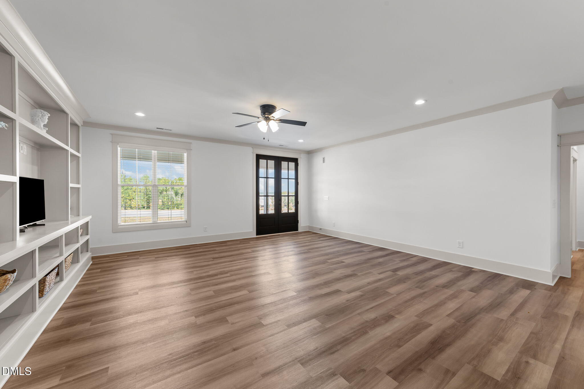 582 Harnett Central Road Fuquay-Varina, NC 27526 - Photo 24 of 51 a view of livingroom with hardwood floor and flat screen tv