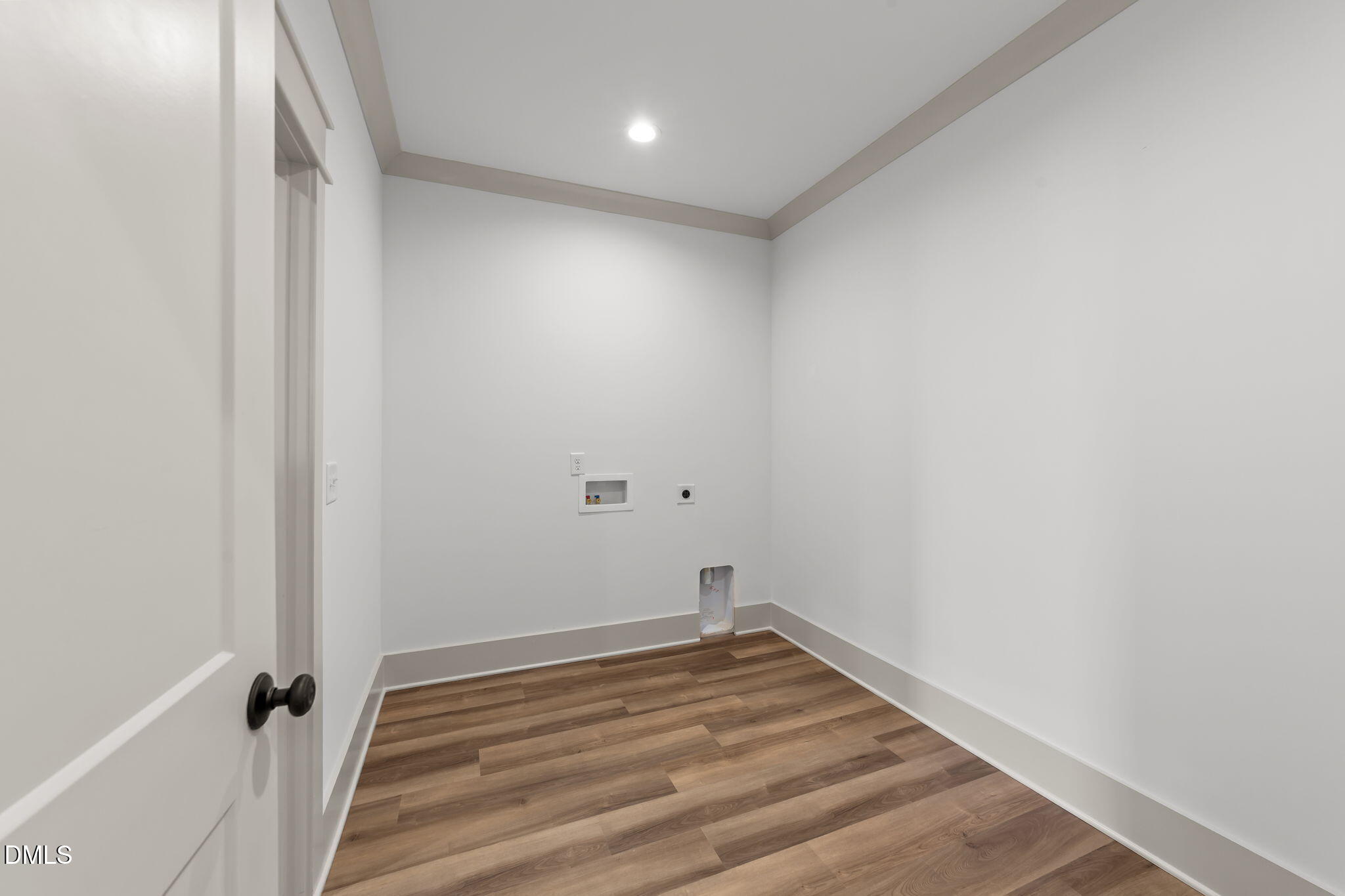 582 Harnett Central Road Fuquay-Varina, NC 27526 - Photo 45 of 51 a view of a room with wooden floor