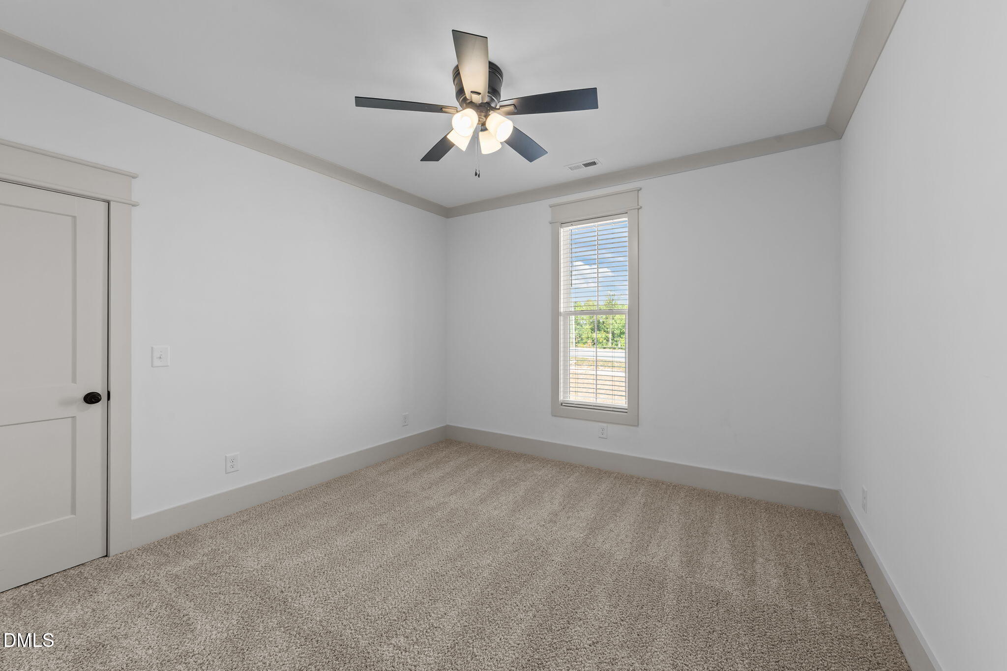 582 Harnett Central Road Fuquay-Varina, NC 27526 - Photo 47 of 51 wooden floor in an empty room with a window