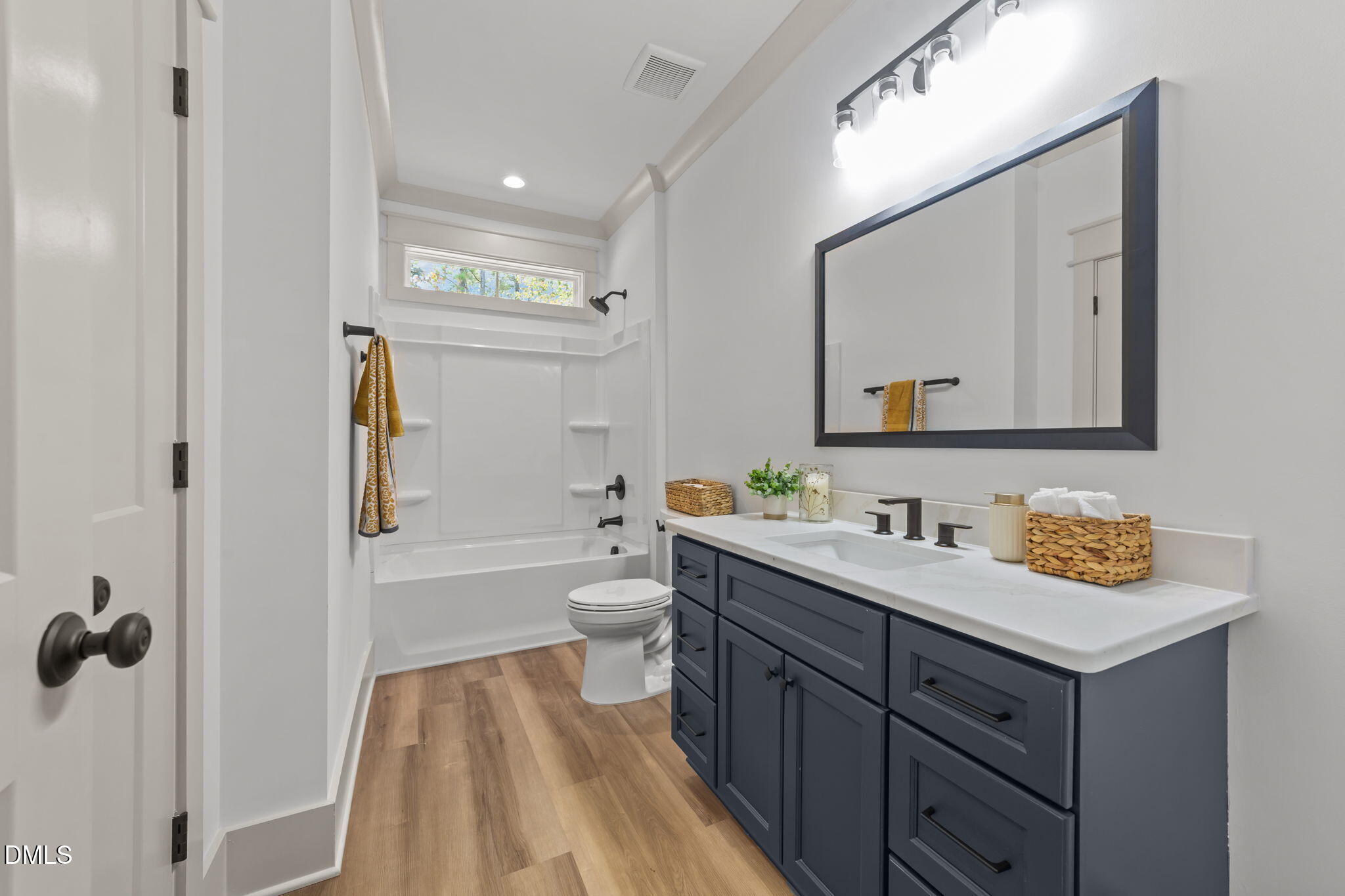582 Harnett Central Road Fuquay-Varina, NC 27526 - Photo 49 of 51 a bathroom with a toilet sink and mirror