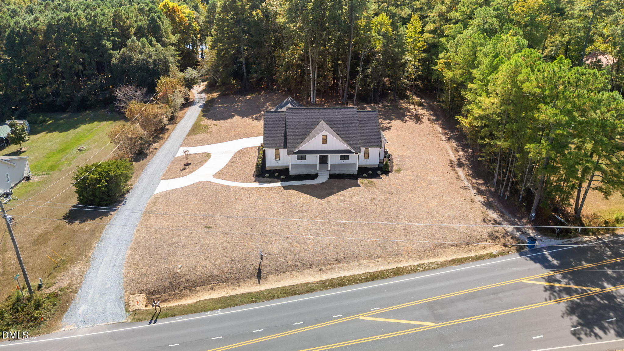 582 Harnett Central Road Fuquay-Varina, NC 27526 - Photo 6 of 51 front view of a house with a yard