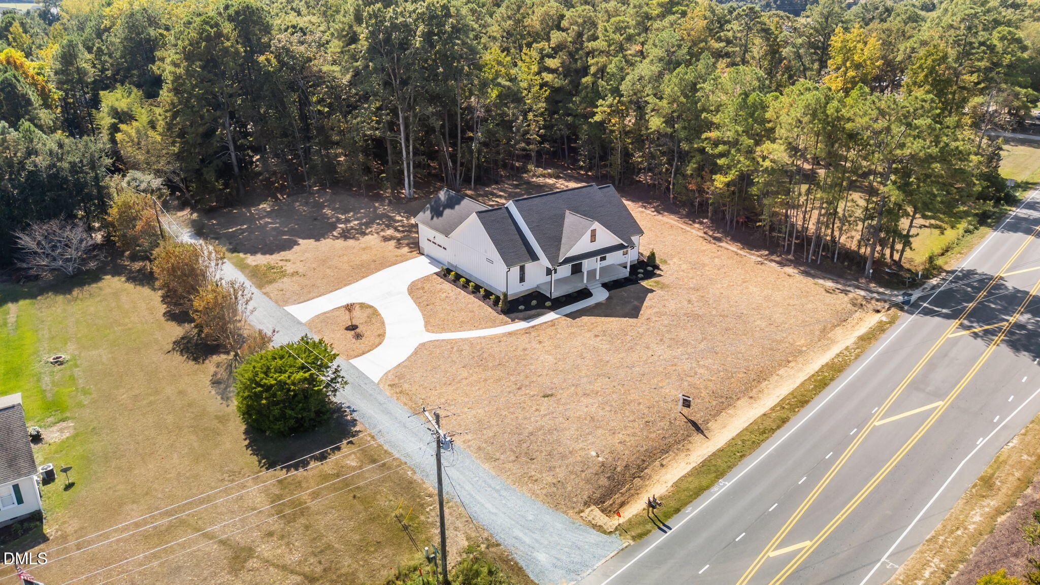 582 Harnett Central Road Fuquay-Varina, NC 27526 - Photo 7 of 51 a view of roof with sitting area