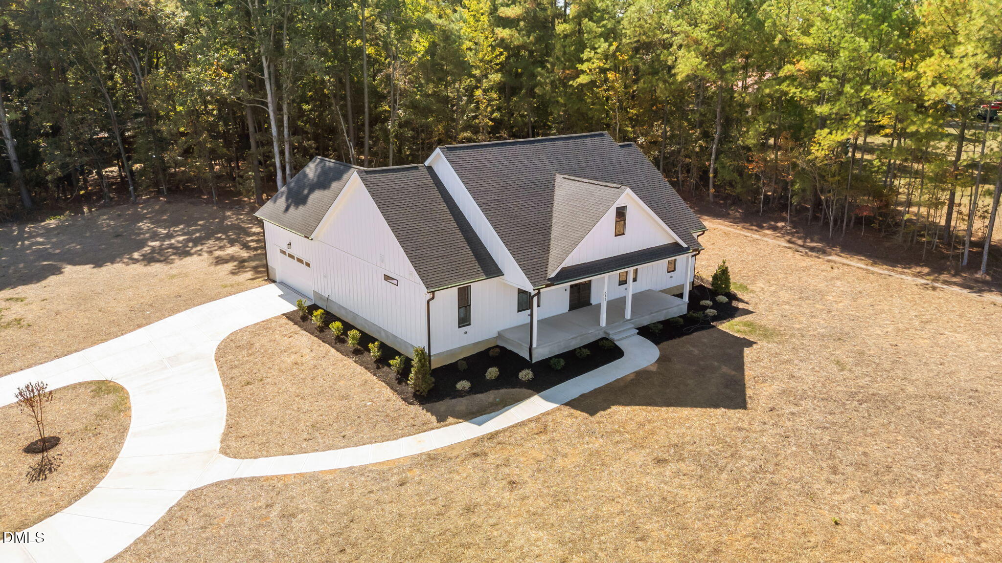 582 Harnett Central Road Fuquay-Varina, NC 27526 - Photo 8 of 51 a view of a house with a yard