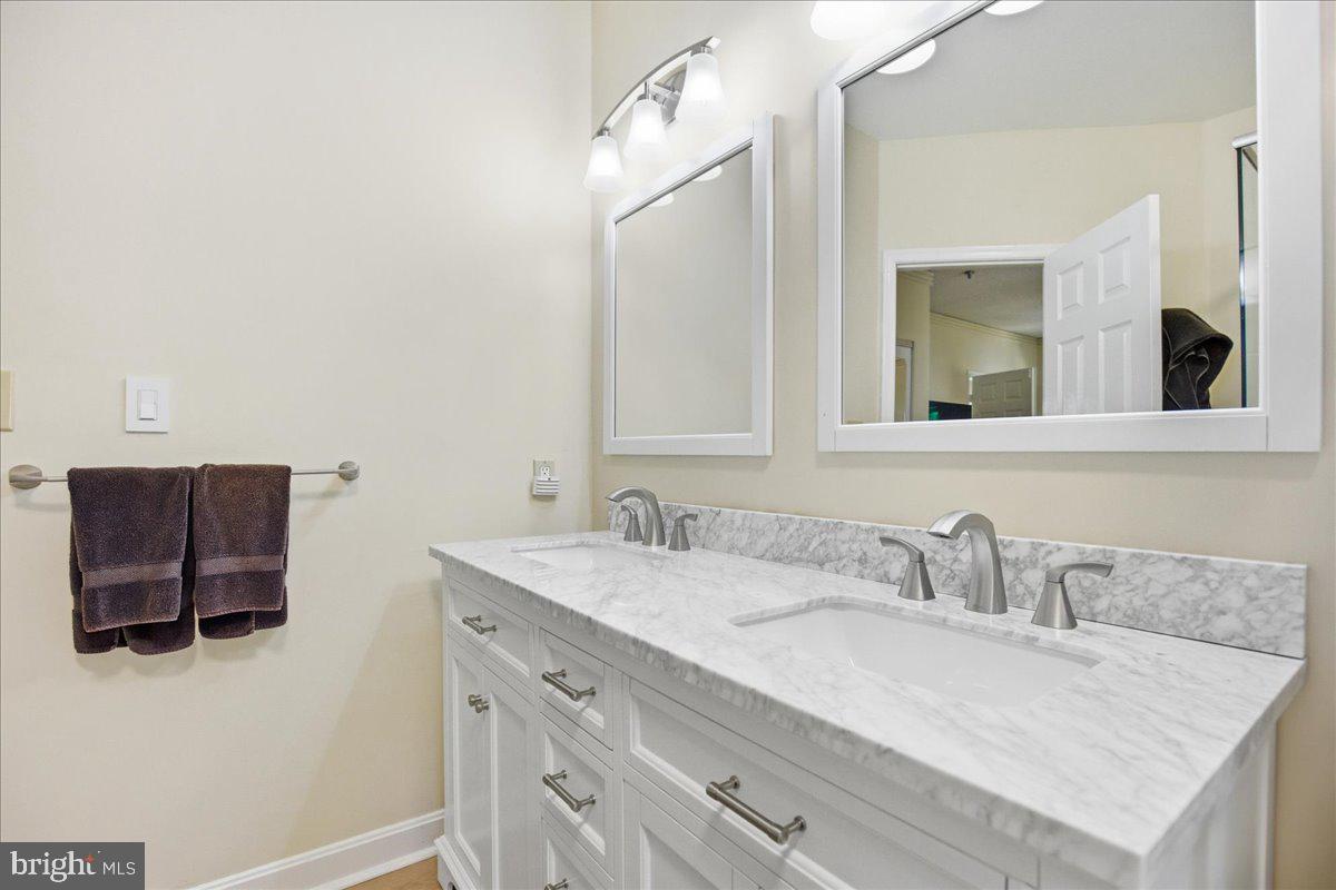 1126 Back Creek Loop, Unit 1126 Solomons, MD 20688 - Photo 32 of 47 Dual sink counter top is solid marble