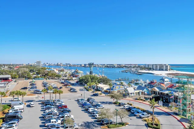 a spacious bathroom with a granite countertop sink mirror and a bathtub
