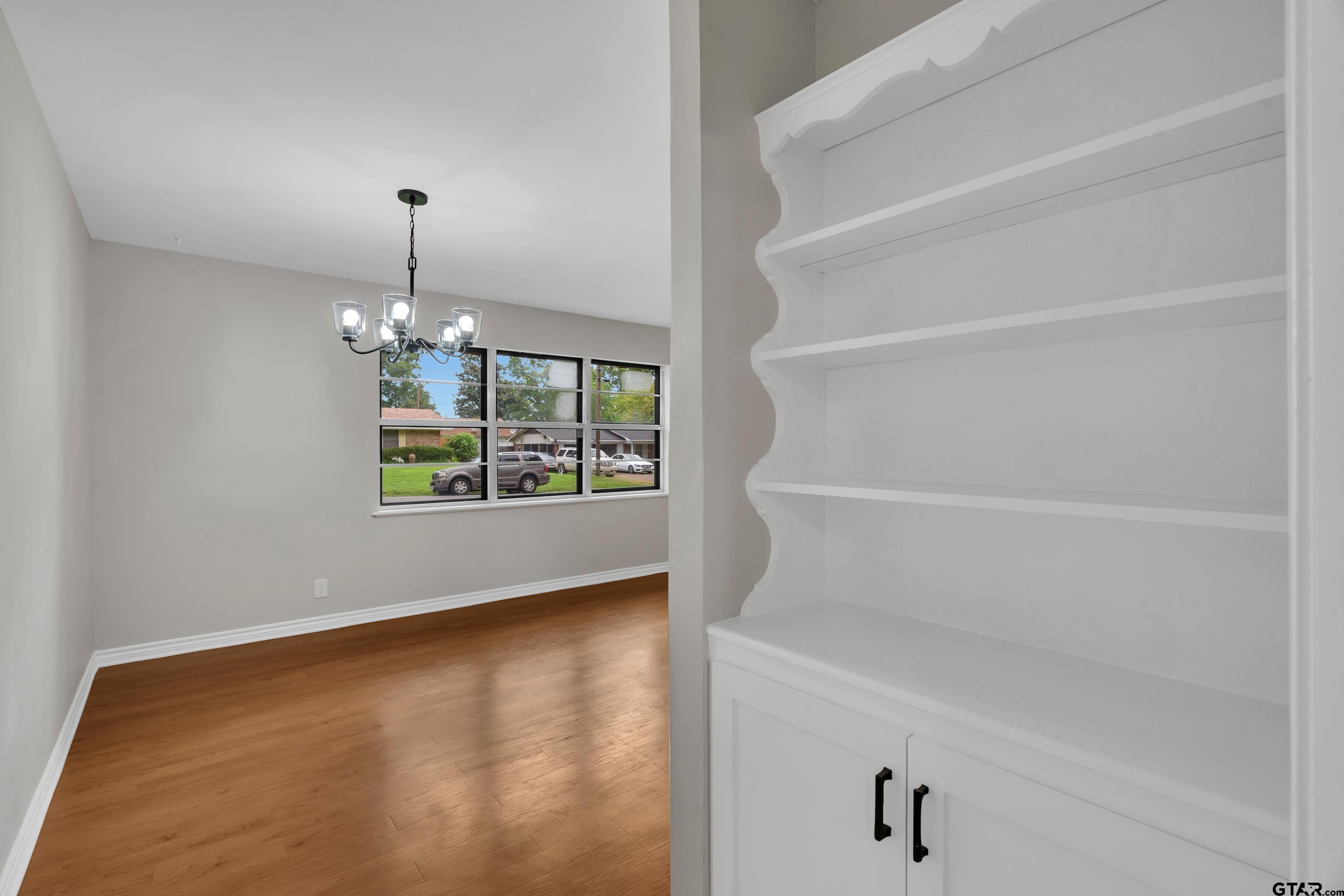 12813 Sunset Drive Tyler, TX 75704 - Photo 15 of 34 a view of an empty room with a window