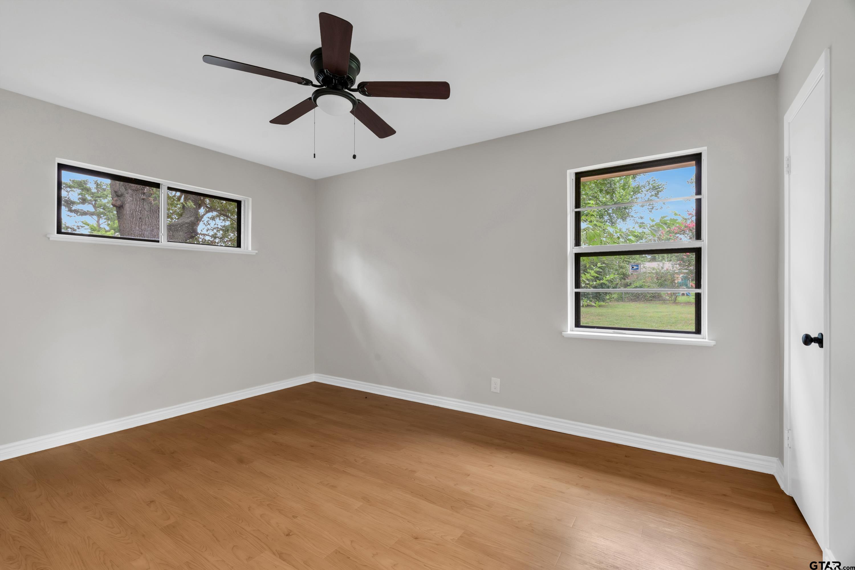 12813 Sunset Drive Tyler, TX 75704 - Photo 20 of 34 a view of an empty room with a window