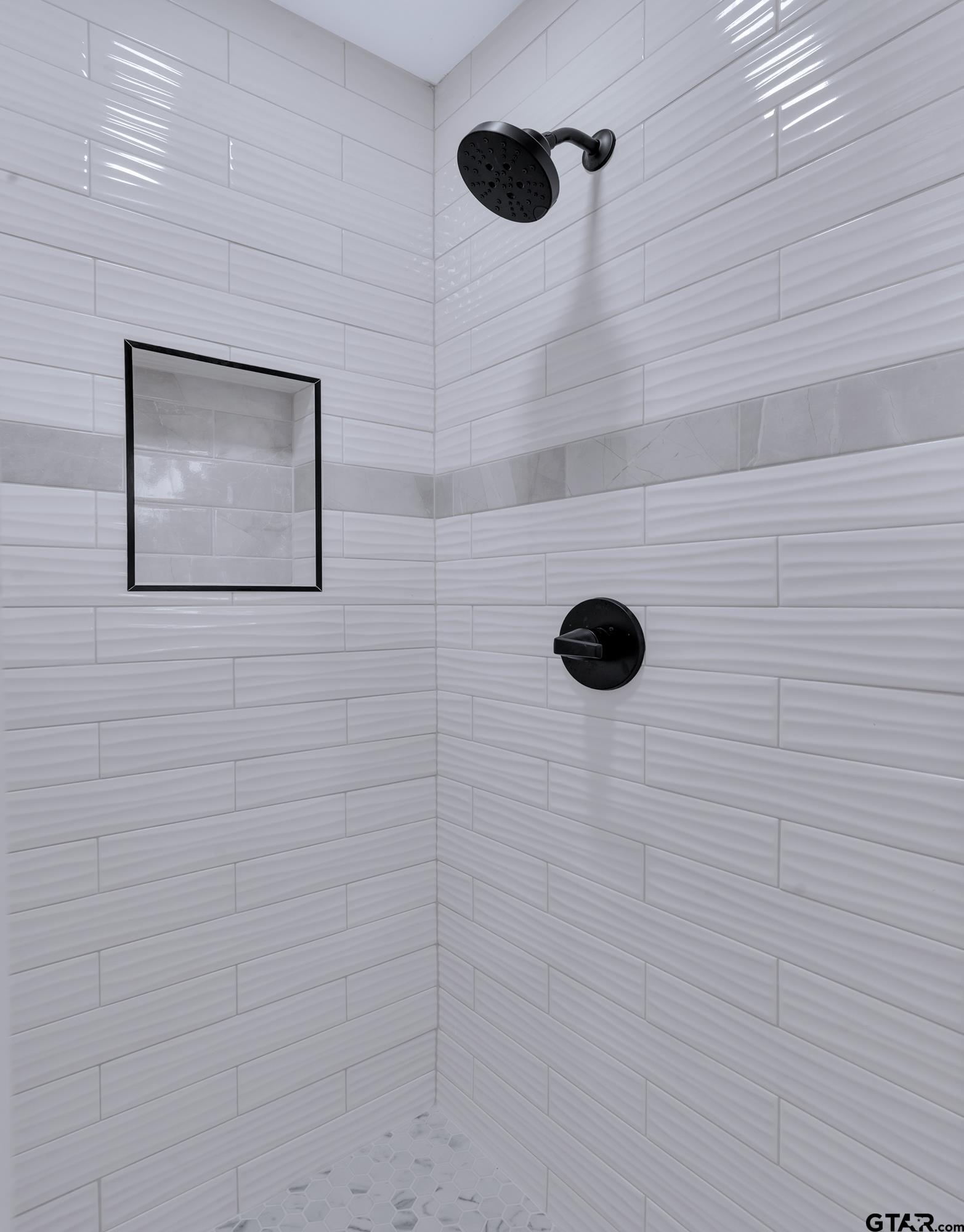 12813 Sunset Drive Tyler, TX 75704 - Photo 23 of 34 a bathroom with a shower