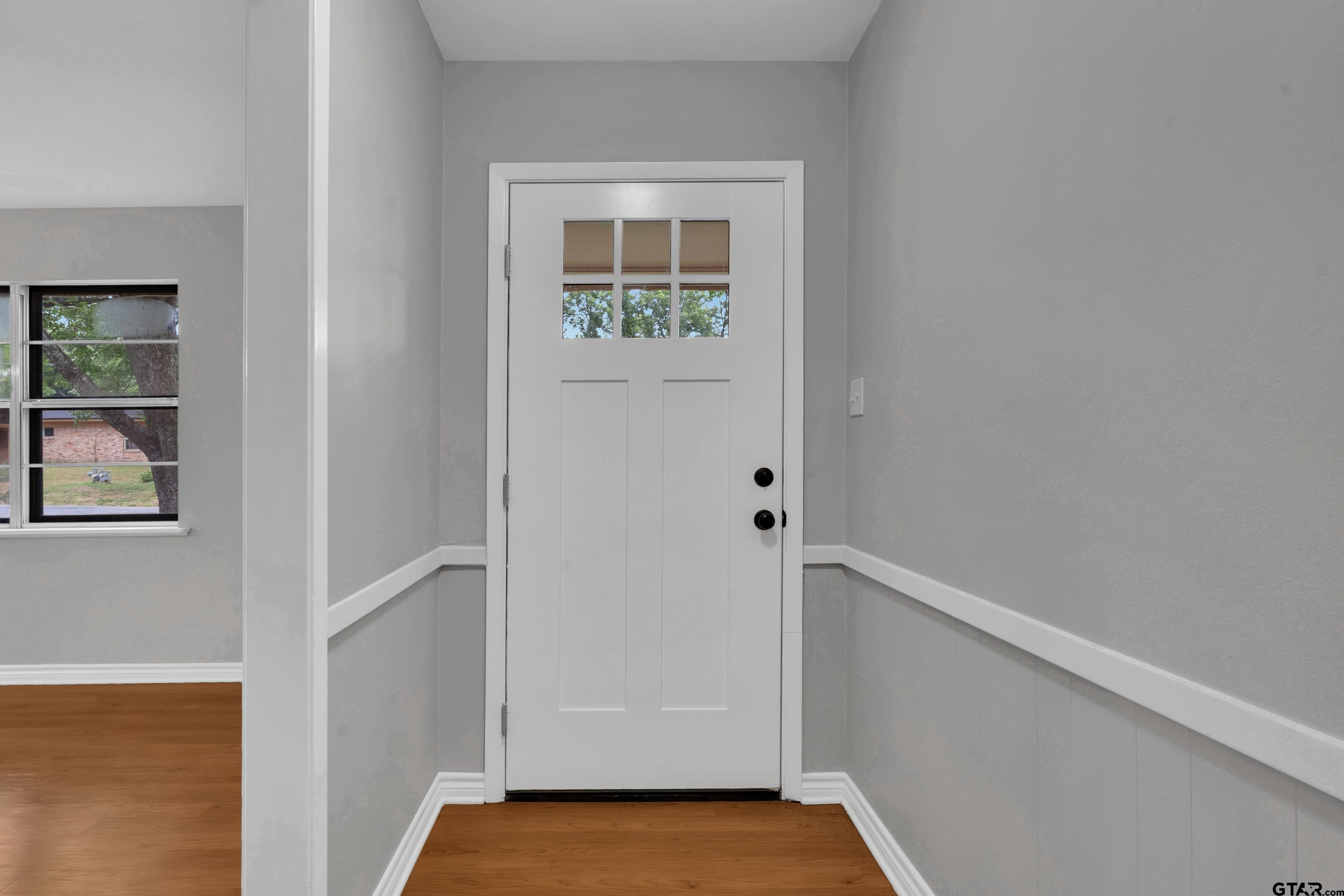 12813 Sunset Drive Tyler, TX 75704 - Photo 3 of 34 a view of an empty room with closet and windows