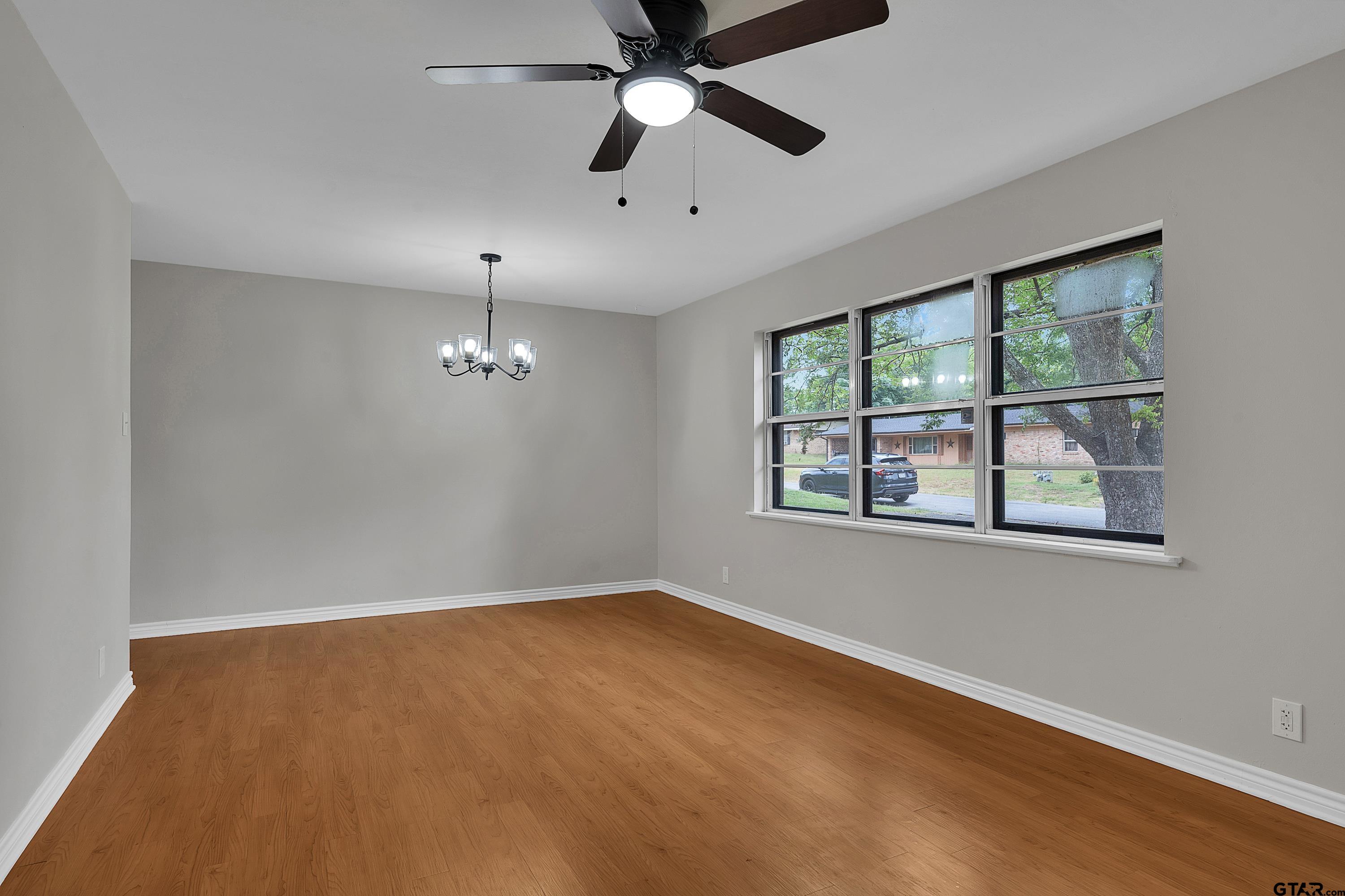 12813 Sunset Drive Tyler, TX 75704 - Photo 4 of 34 a view of an empty room with a window