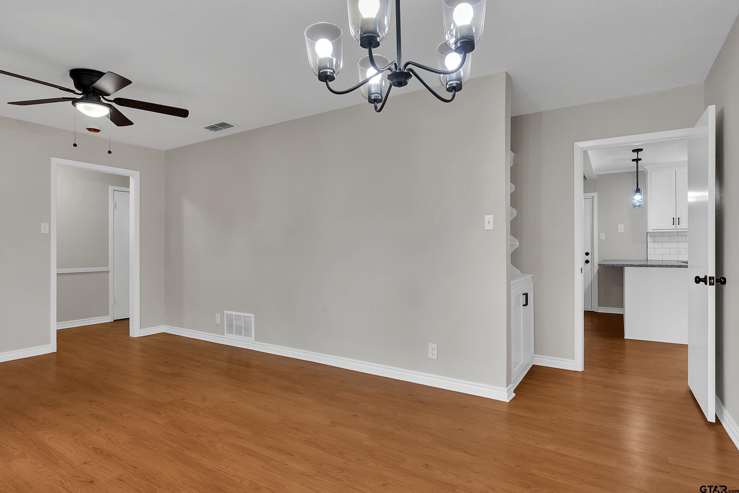 12813 Sunset Drive Tyler, TX 75704 - Photo 5 of 34 a view of a room with wooden floor