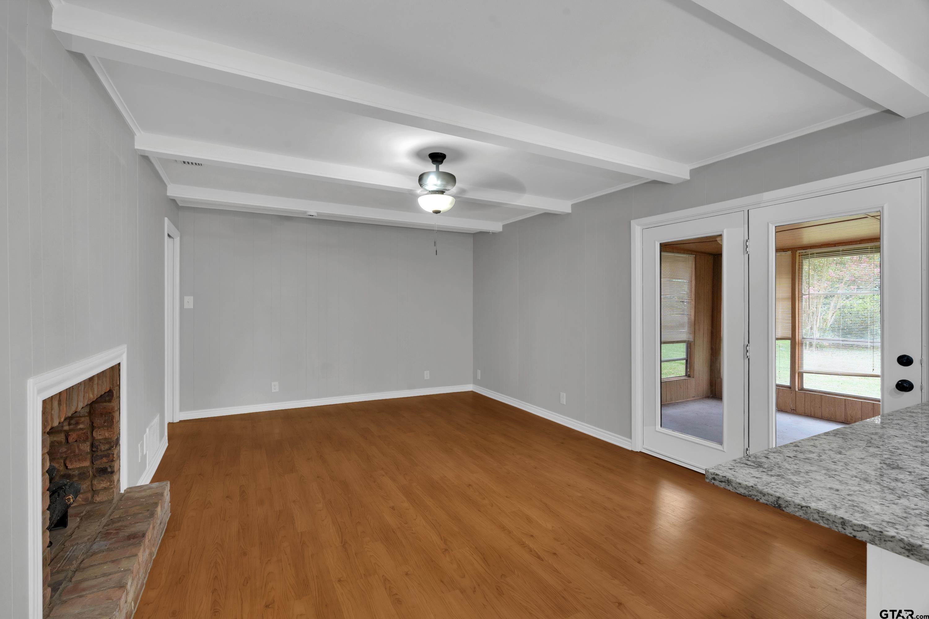 12813 Sunset Drive Tyler, TX 75704 - Photo 10 of 34 a view of an empty room with glass door