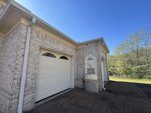 a view of a front door and outdoor space