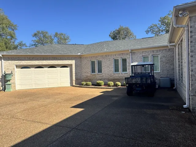 a house view with a outdoor space