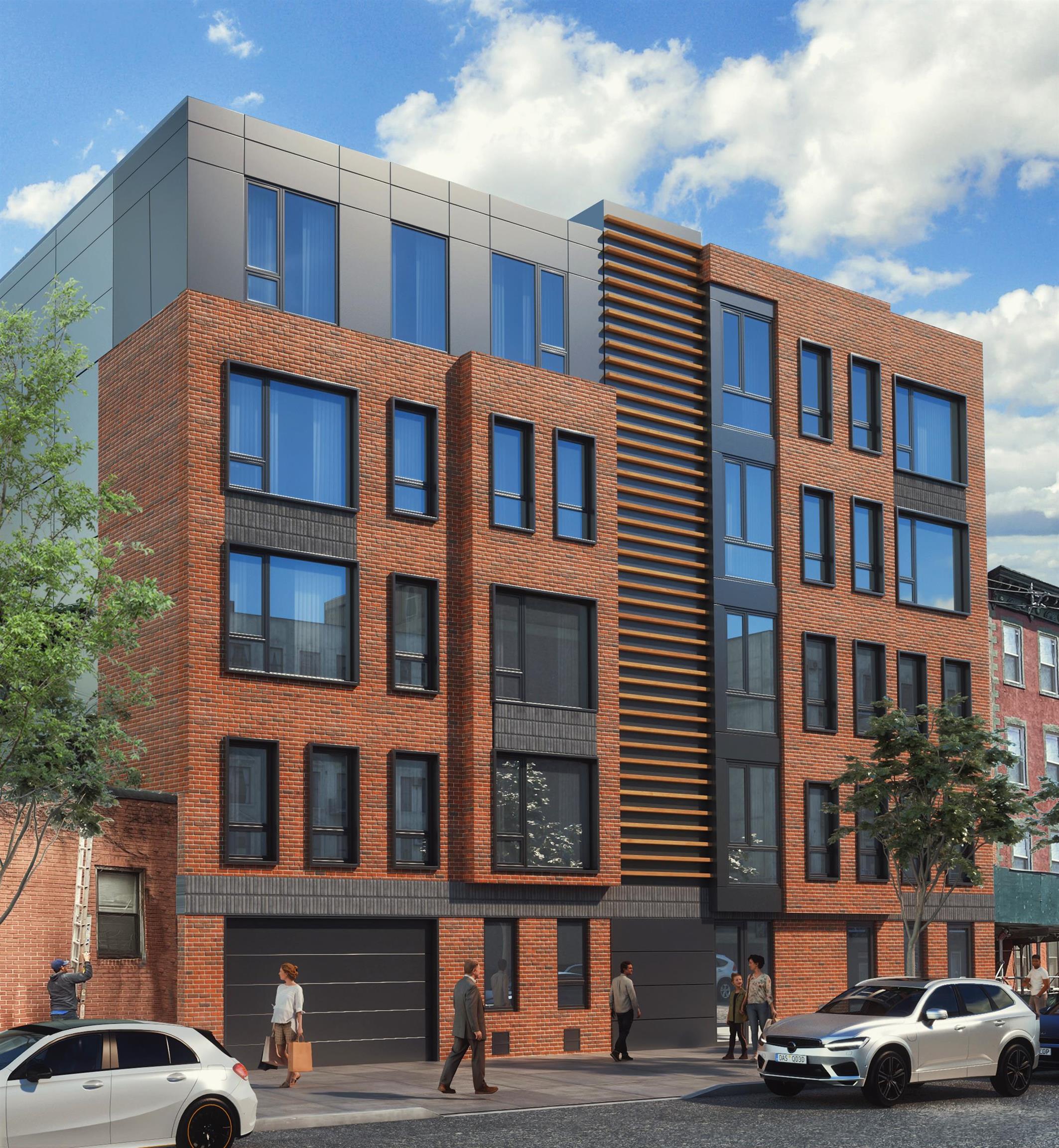 504 2nd Street, Unit 4W Hoboken, NJ 07030 - Photo 1 of 6 a front view of a building with lot of cars and trees