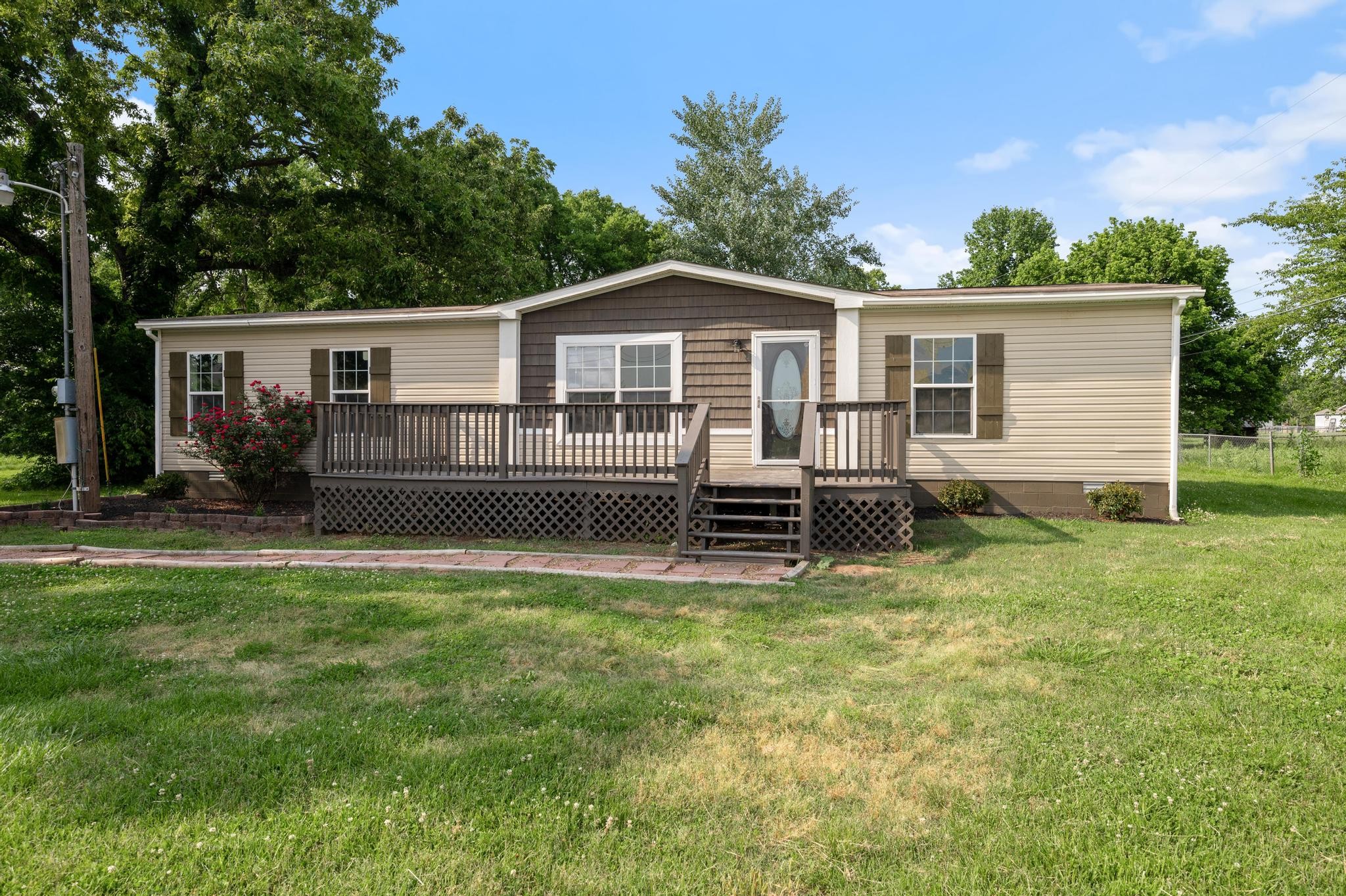 3787 Asbury Road Murfreesboro, TN 37129 - Photo 1 of 20 a view of a house with a yard and plants