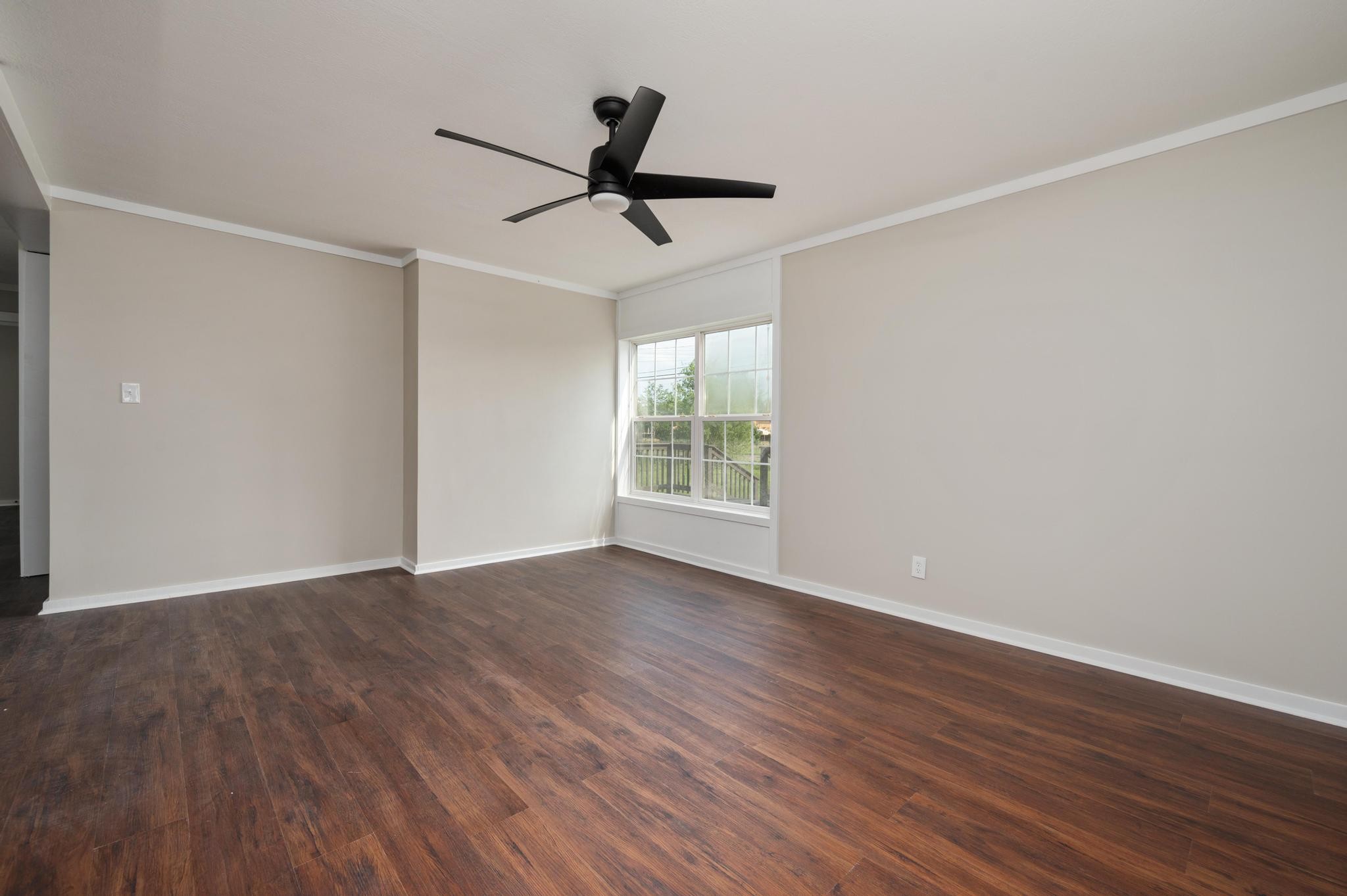 3787 Asbury Road Murfreesboro, TN 37129 - Photo 11 of 20 a view of empty room with wooden floor and fan