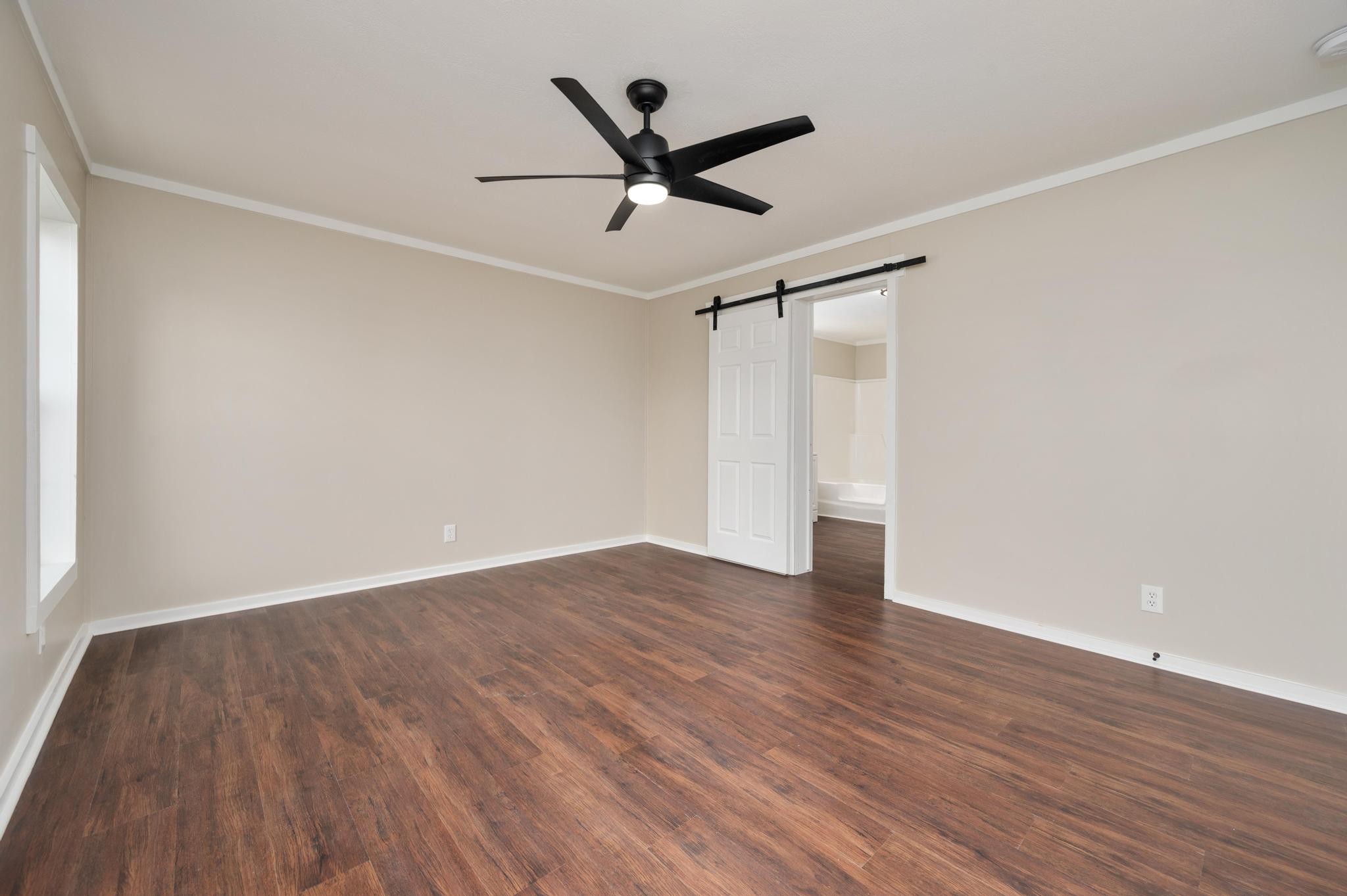 3787 Asbury Road Murfreesboro, TN 37129 - Photo 14 of 20 an empty room with wooden floor and a ceiling fan