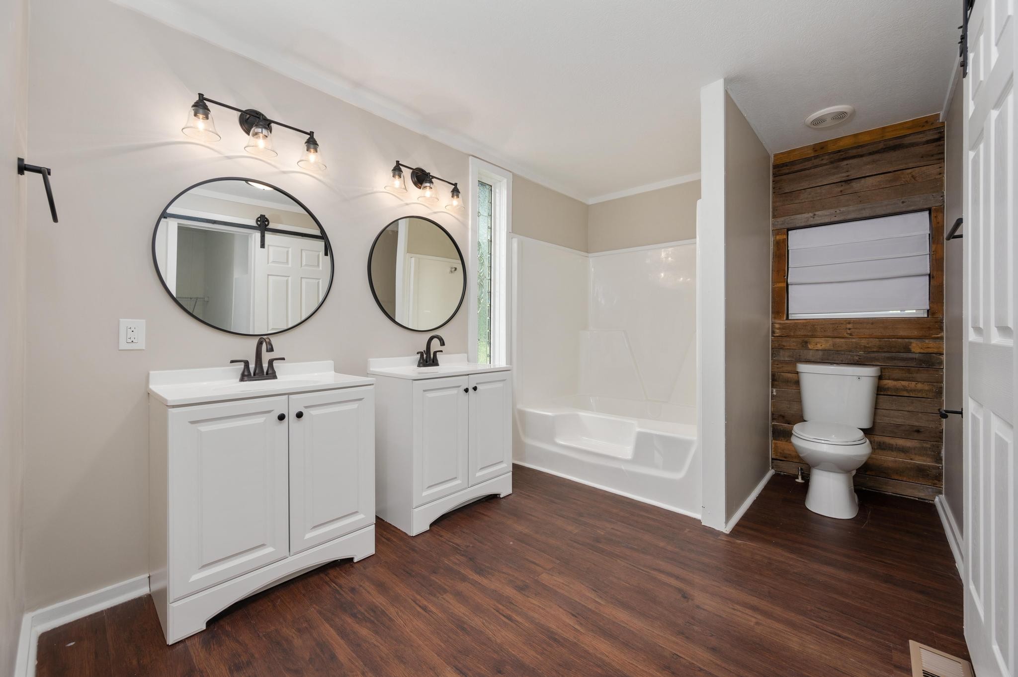 3787 Asbury Road Murfreesboro, TN 37129 - Photo 15 of 20 a bathroom with a toilet a sink and mirror