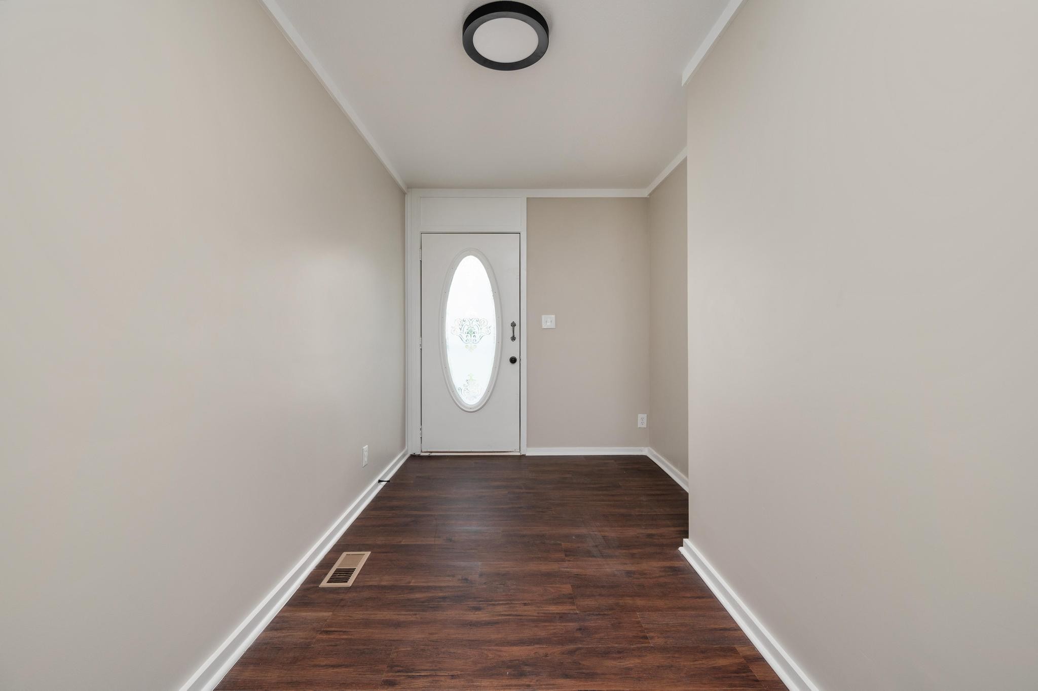 3787 Asbury Road Murfreesboro, TN 37129 - Photo 4 of 20 a view of a room with wooden floor and white walls