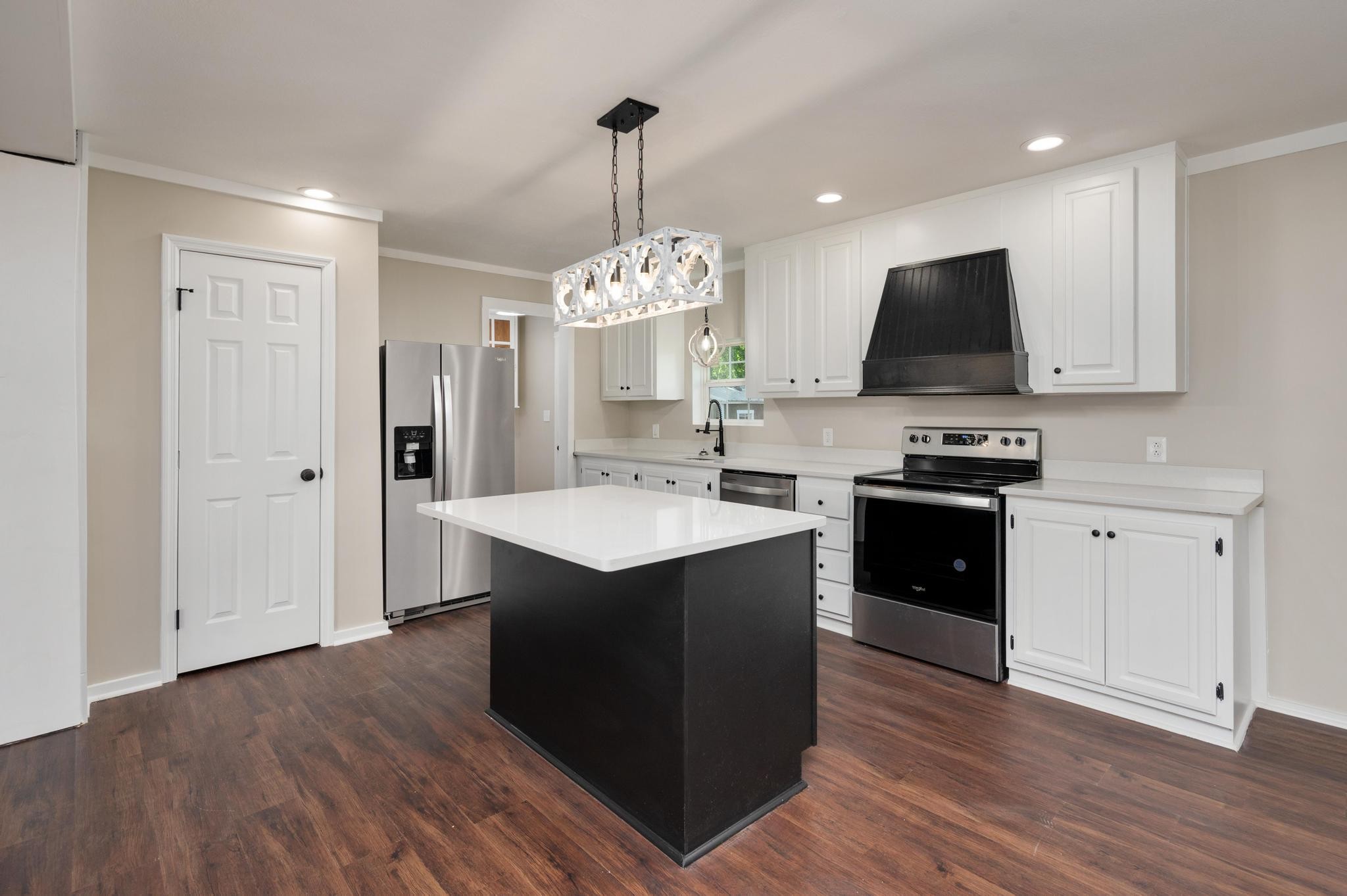 3787 Asbury Road Murfreesboro, TN 37129 - Photo 8 of 20 a kitchen with stainless steel appliances a sink stove and refrigerator