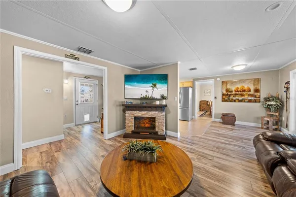 a kitchen with stainless steel appliances granite countertop a sink and cabinets