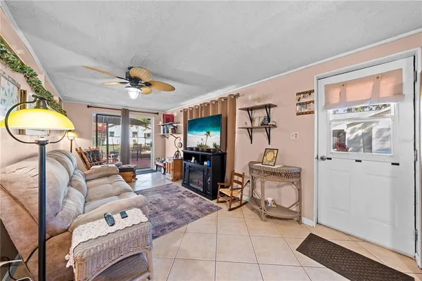 a kitchen with stainless steel appliances kitchen island granite countertop a sink and cabinets