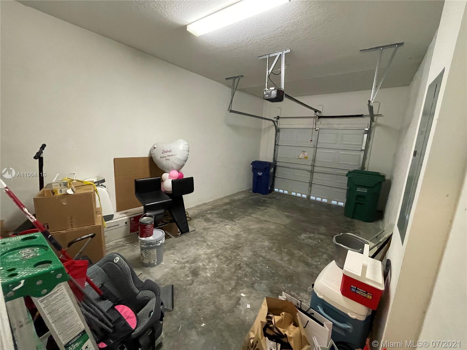 631 Northeast 191st Terrace Miami, FL 33179 - Photo 27 of 28 a room with musical instruments