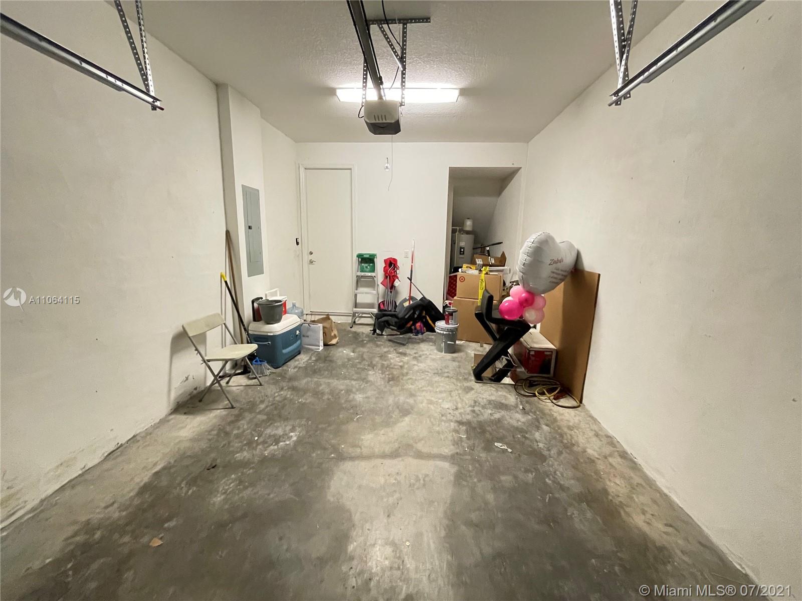 631 Northeast 191st Terrace Miami, FL 33179 - Photo 28 of 28 a room with musical instruments