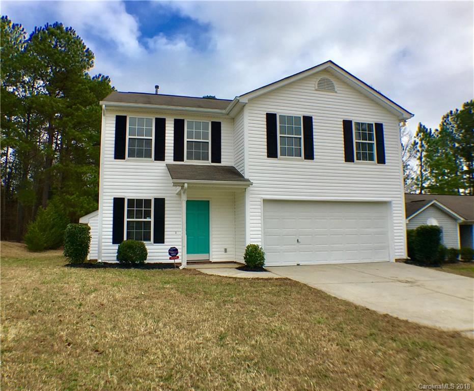 2543 Captains Watch Road Northeast Kannapolis, NC 28083 - Photo 16 of 17 a front view of a house with garage