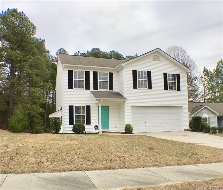 2543 Captains Watch Road Northeast Kannapolis, NC 28083 - Photo 17 of 17 a front view of a house with a yard and garage
