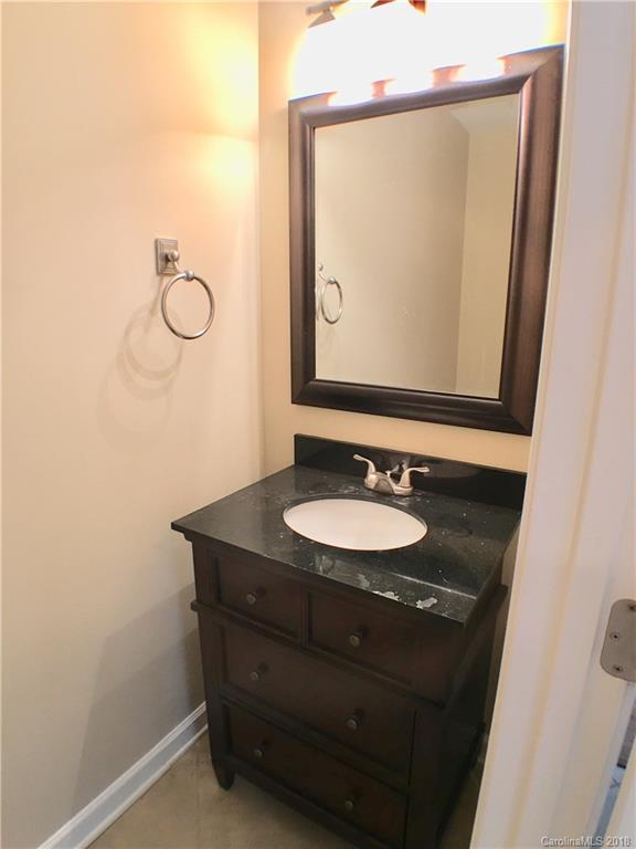 2543 Captains Watch Road Northeast Kannapolis, NC 28083 - Photo 9 of 17 a bathroom with a sink and a mirror