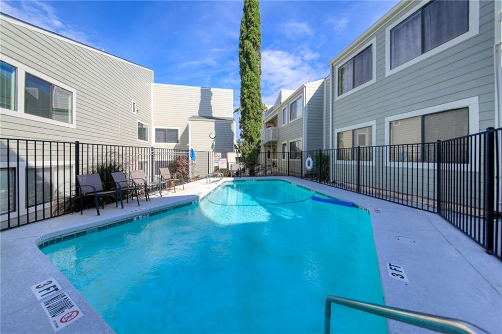 a view of a backyard with a patio