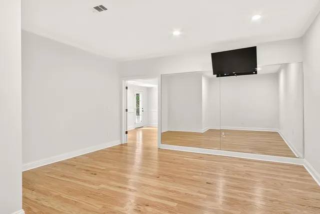 an aerial view of a house with swimming pool and outdoor space