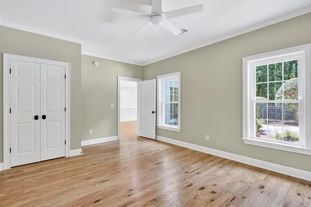 an aerial view of a house with swimming pool and garden view
