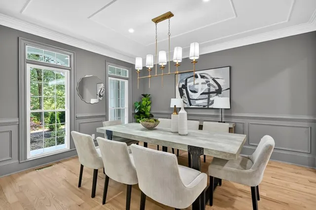 a view of a table and chairs in a house