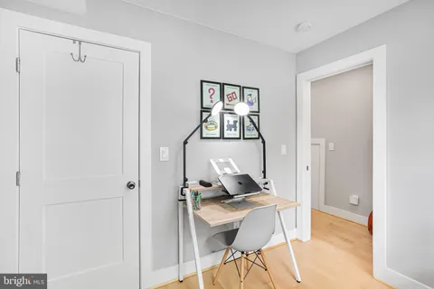 a room with a table and chairs