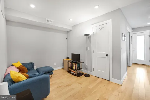 a room with furniture and gym equipment
