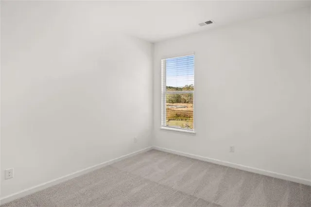a spacious bathroom with a double vanity sink mirror and