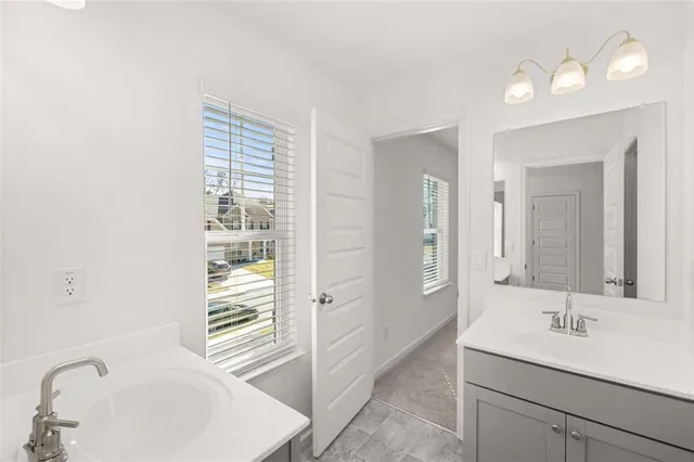 an aerial view of a house with a lake view