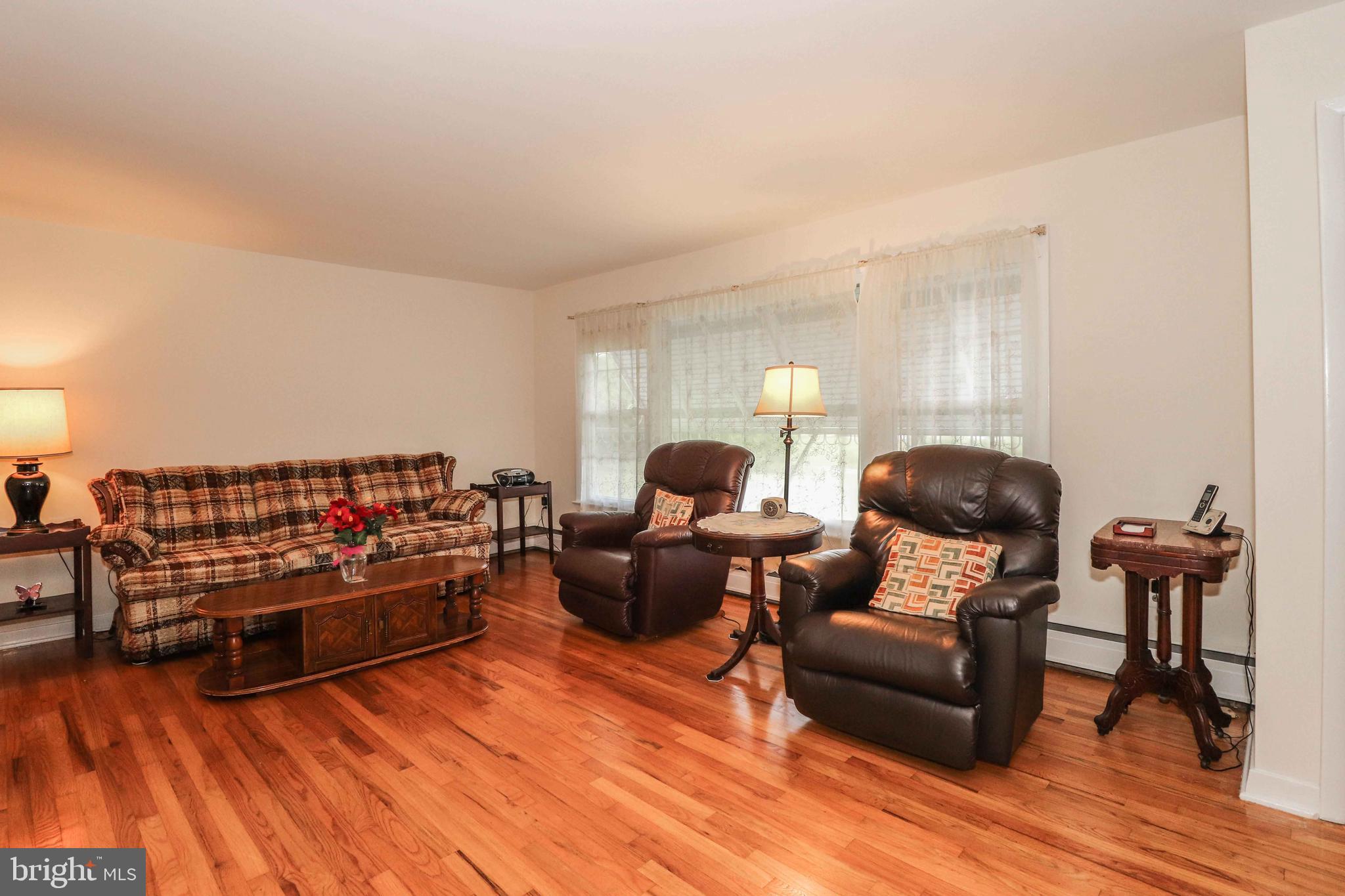 25 Burd Road Pennington, NJ 08534 - Photo 8 of 15 Living Room , hardwood floors, fireplace
