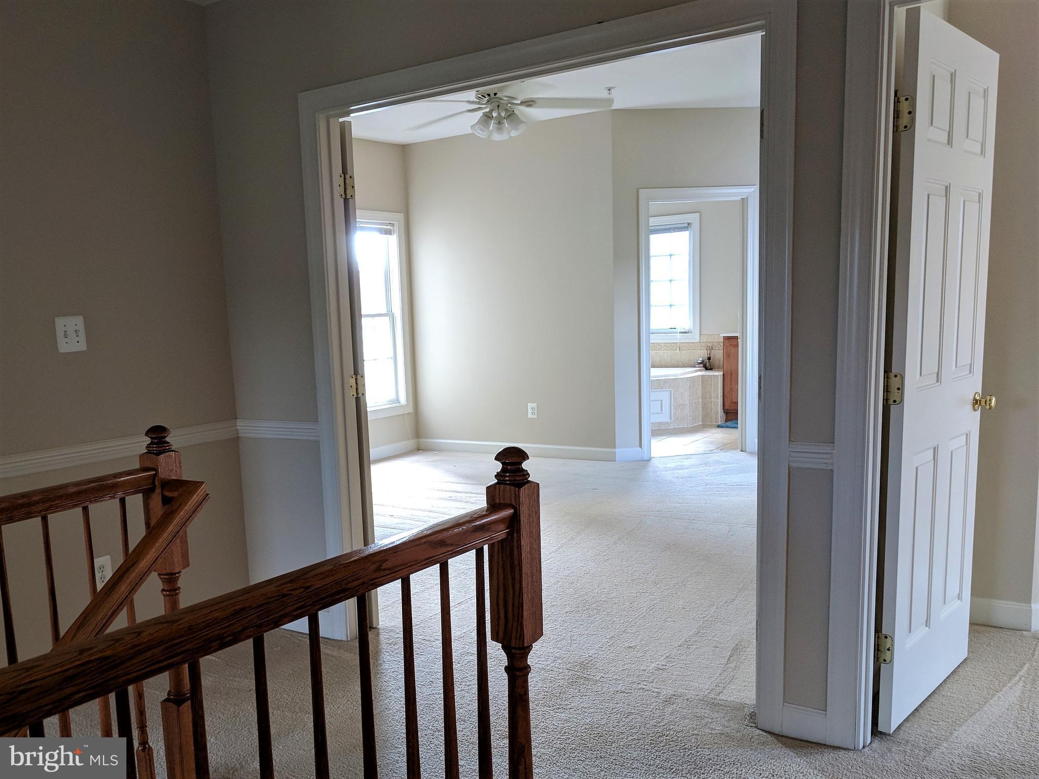 23014 Birch Mead Road Clarksburg, MD 20871 - Photo 14 of 30 Double doors open to a grand master suite.